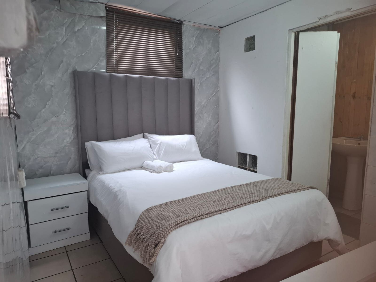 Ensuite double room at Ubuntu Kraal Backpackers in Orlando West, Soweto