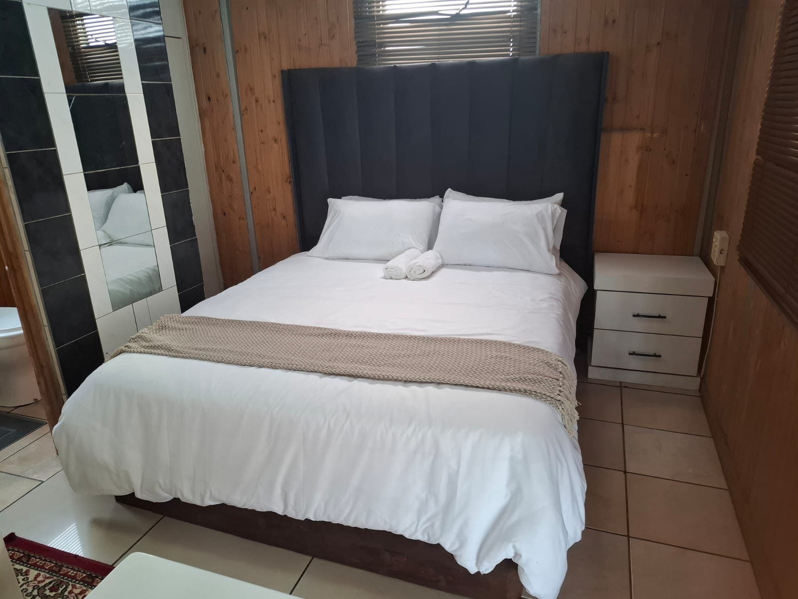 Double room with private bathroom at Ubuntu Kraal, Soweto